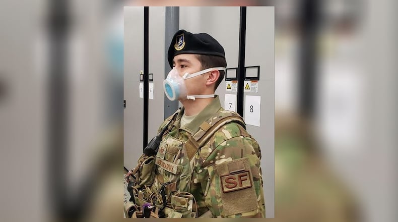 An 11th Security Support Squadron member wears a mask received through a pilot initiative called the Air Force Rapid Agile Manufacturing Platform at Joint Base Andrews, Md., May 15. The framework is designed to keep the Air Force supply system independent of the civilian medical market. (U.S. Air Force courtesy photo)
