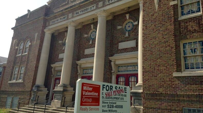 A real estate and development firm, which recently bought an iconic church located near the University of Dayton. BRIAN KOLLARS/ STAFF