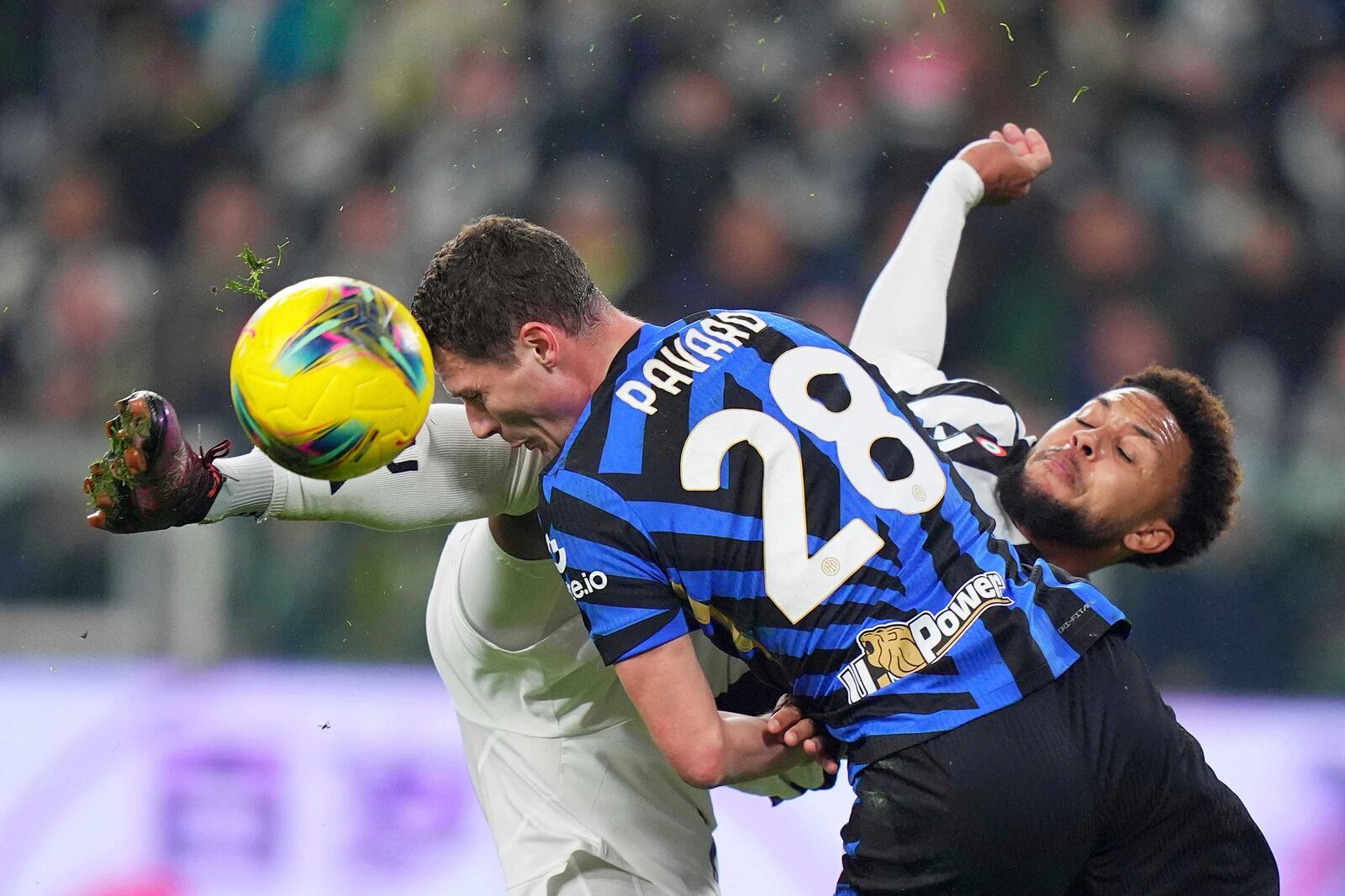 FILE - Inter Milan's Benjamin Pavard, left, and Juventus' Weston McKennie, right, challenge for the ball during the Italian Serie A soccer match between Juventus and Inter Milan at the Juventus Stadium in Turin, Italy, Sunday, Feb. 16, 2025. (Spada/LaPresse via AP, File)