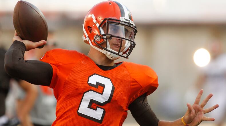 Cleveland Browns quarterback Johnny Manziel throws a pass at the Orange and Brown Scrimmage on Friday, Aug. 7, 2015, at Ohio Stadium in Columbus. David Jablonski/Staff