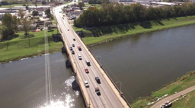 The Keowee Street Bridge over the Great Miami River will close in December of this year. A construction bid of $8.8 million has been awarded to Eagle Construction for a new bridge and demolition of the existing bridge. TY GREENLEES / STAFF