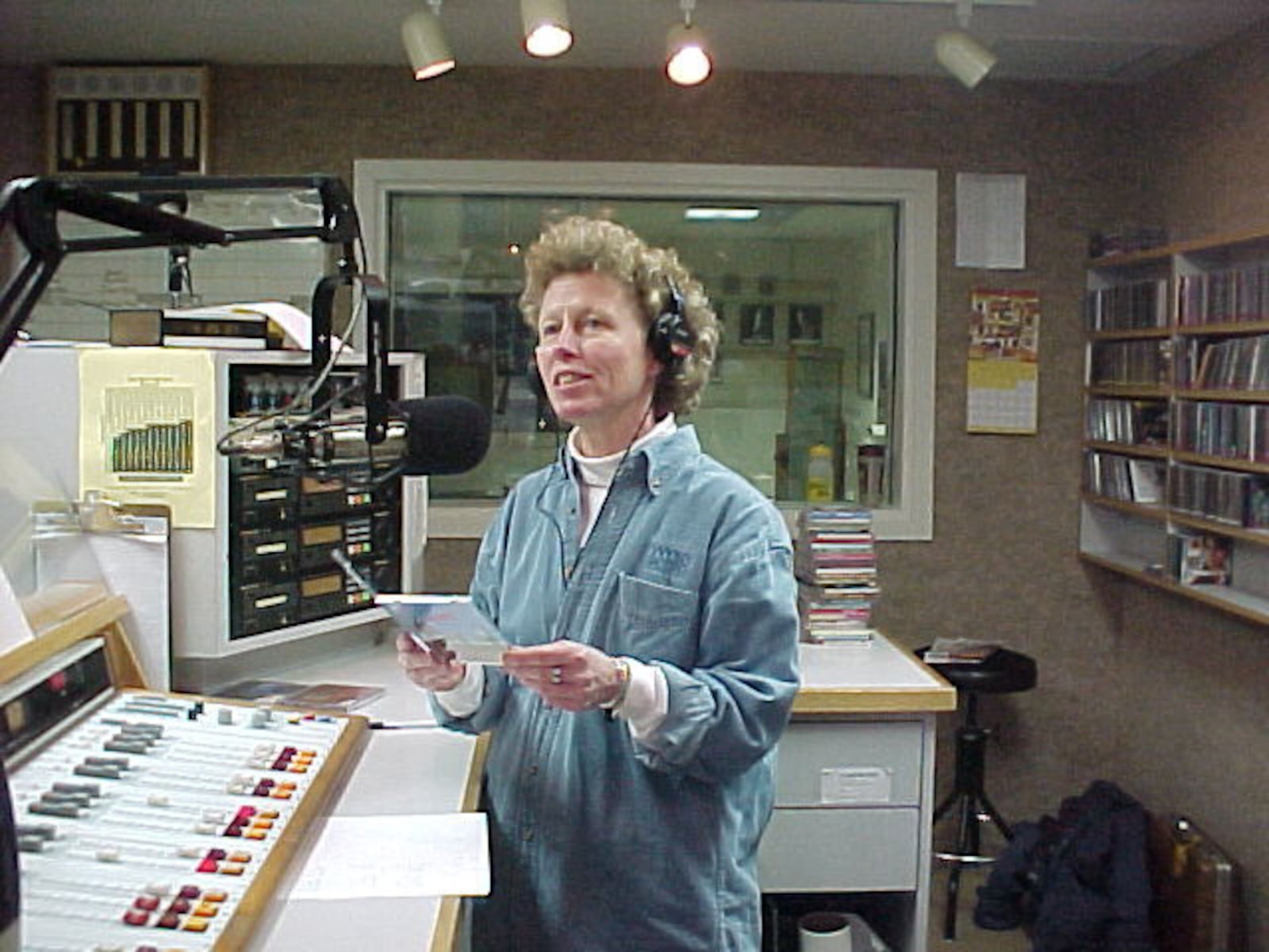 Women in Music volunteer host Pam Conine broadcasts one of the 
last programs in the show's 26-year run on WYSO-FM.  Station management 
gave it the ax with it's last broadcast to be March 24. DAYTON DAILY NEWS ARCHIVES