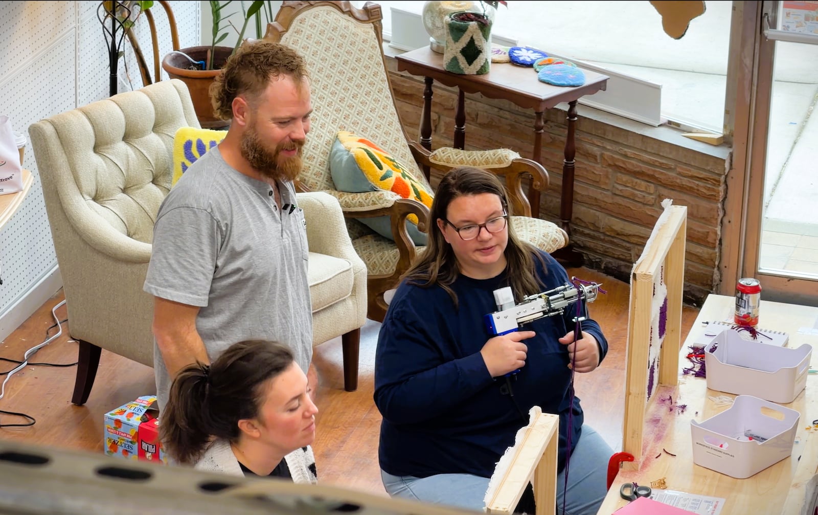 Co-owner Graeme Buchanan (top left) teaches a workshop on rug tufting at Common Thread Fiber Art Studio in Xenia, November 21, 2025. DAVID SHERMAN/STAFF