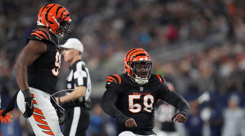 Cincinnati Bengals defensive end Joseph Ossai (58) celebrates sacking Dallas Cowboys quarterback Cooper Rushduring the first half of an NFL football game, Monday, Dec. 9, 2024, in Arlington, Texas. JULIO CORTEZ/ASSOCIATED PRESS