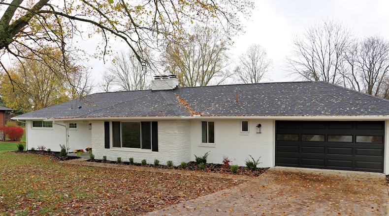 Listed for $374,900 by RE/MAX Victory and Associates, the painted-brick ranch at 5633 Little Sugarcreek Road has about 2,047 square feet of living space, plus the finished half of the basement. CONTRIBUTED