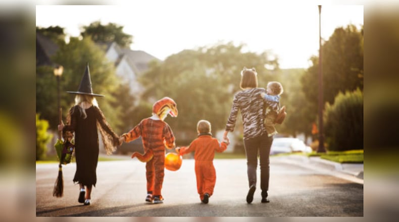 Trick-or-treat night is fast approaching. When choosing a costume, stay away from long trailing fabric. FILE