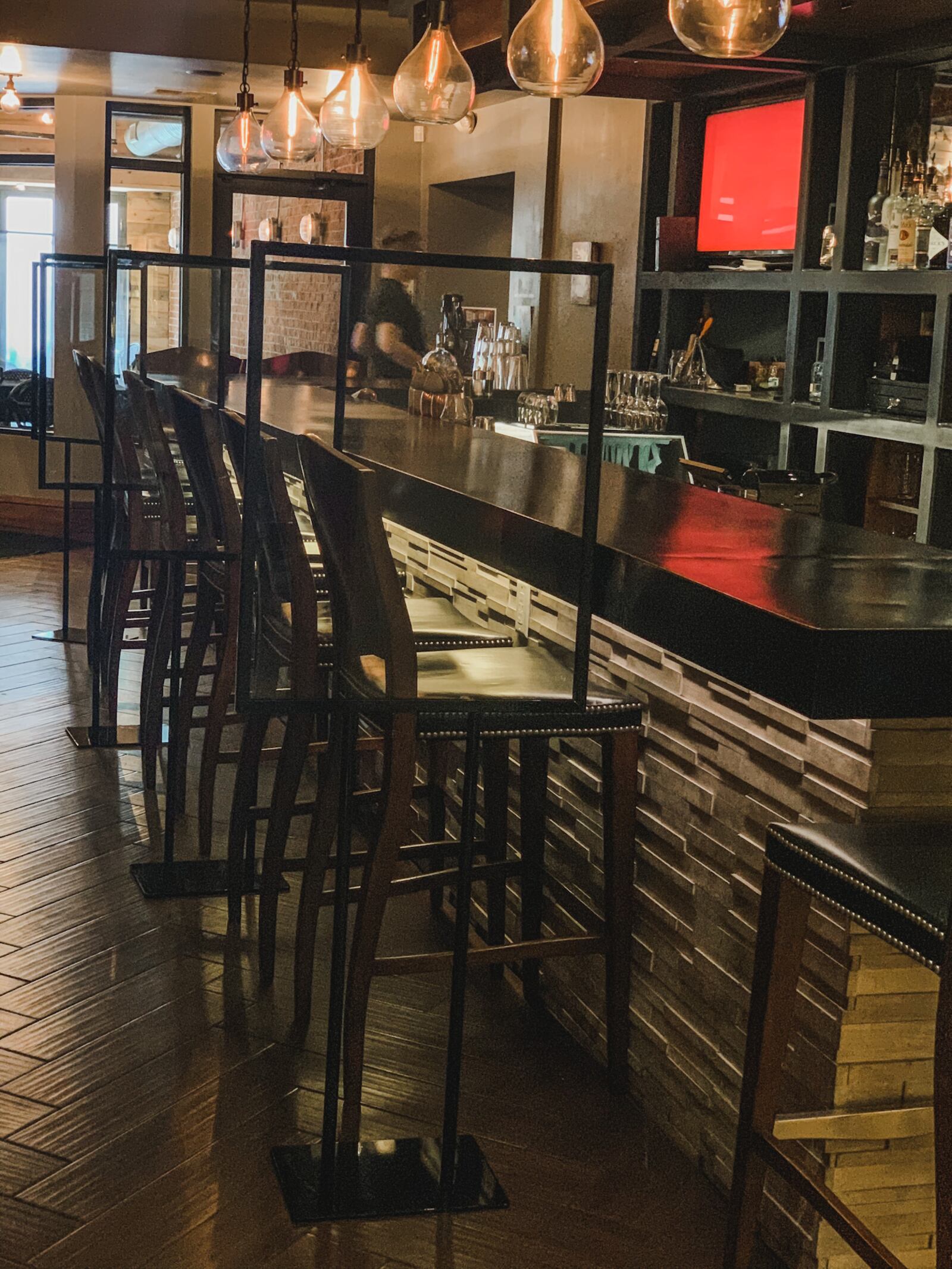 New dividers have been put up in the bar area at Roost. They give patrons the ability to make eye contact safely. Contributed photo