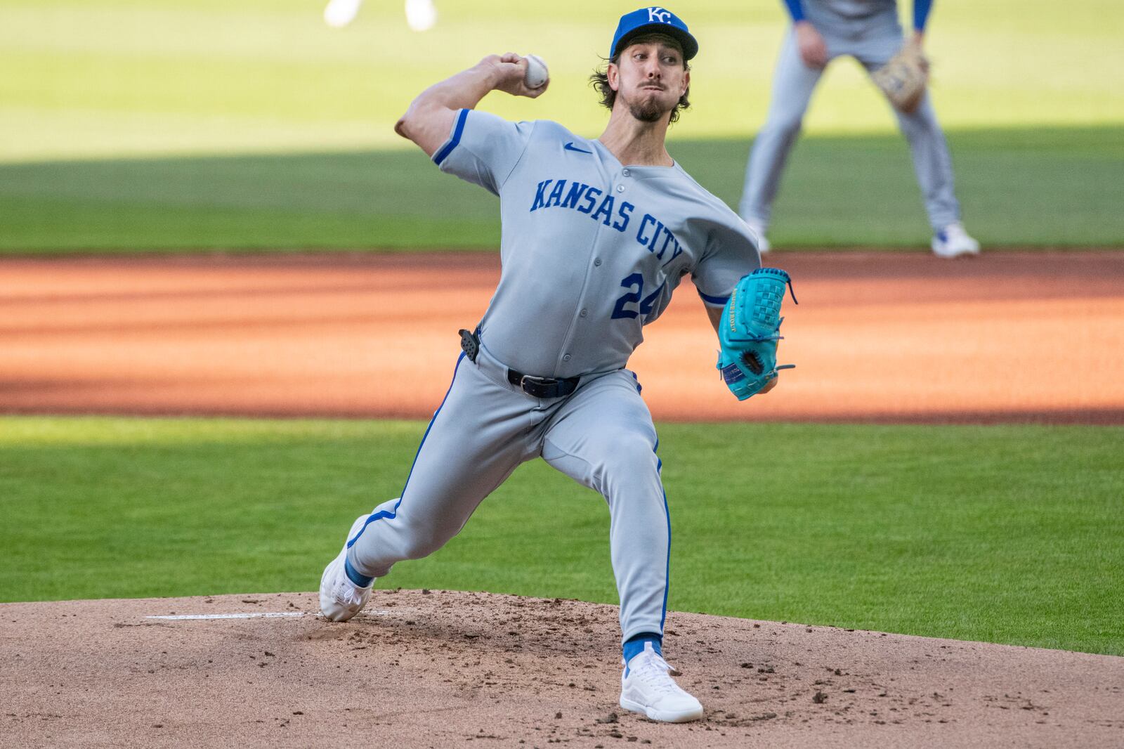 Kansas City Royals staring pitcher Michael Lorenzen delivers against the Cleveland Guardians during the first inning of a baseball game in Cleveland, Saturday, April 12, 2025. (AP Photo/Phil Long)