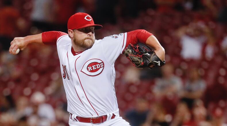 Cincinnati Reds relief pitcher Drew Storen throws in the ninth inning against the Baltimore Orioles, Tuesday, April 18, 2017, in Cincinnati. The Reds won 9-3. (AP Photo/John Minchillo)