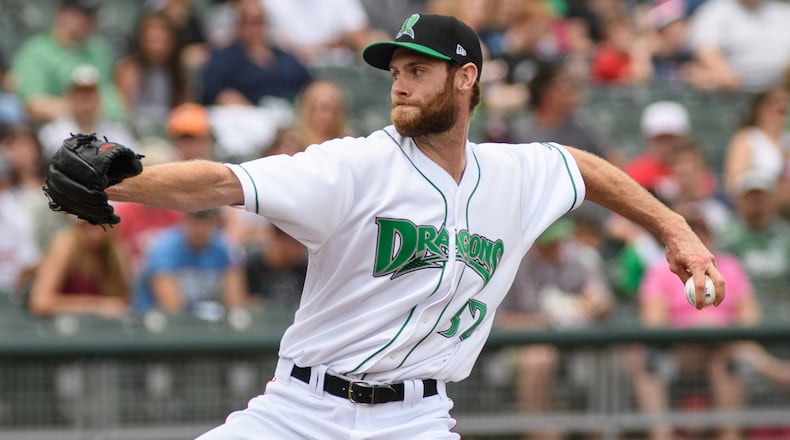 Cincinnati Reds relief pitcher Tony Cingrani throws a pitch during a rehab assignment with the Dragons on Monday at Fifth Third Field. Cingrani threw 24 pitches in the first inning and didn’t allow a hit. Contributed Photo/ Bryant Billing