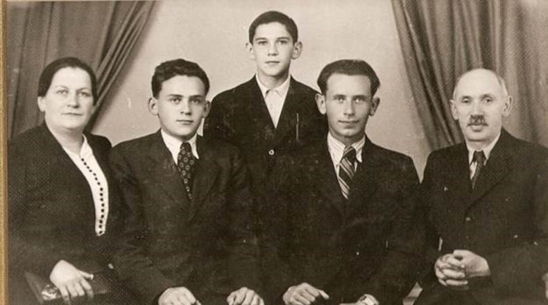 Larry (Laszlo Klein) is second from the left. The family is, in order, Gizella Berncsweig-Klein (mother), Laszlo Klein (Larry), Endre Klein (younger brother), Gyorgy Klein (older brother) and Sandor Klein (father). CONTRIBUTED