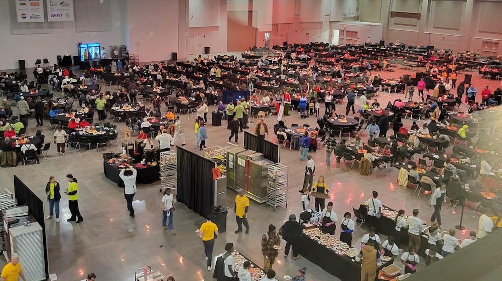 About 300 volunteers helped make and serve about 7,000 meals at the 2025 Dayton Feast of Giving on Thanksgiving Day, November 27, 2025. LONDON BISHOP/STAFF