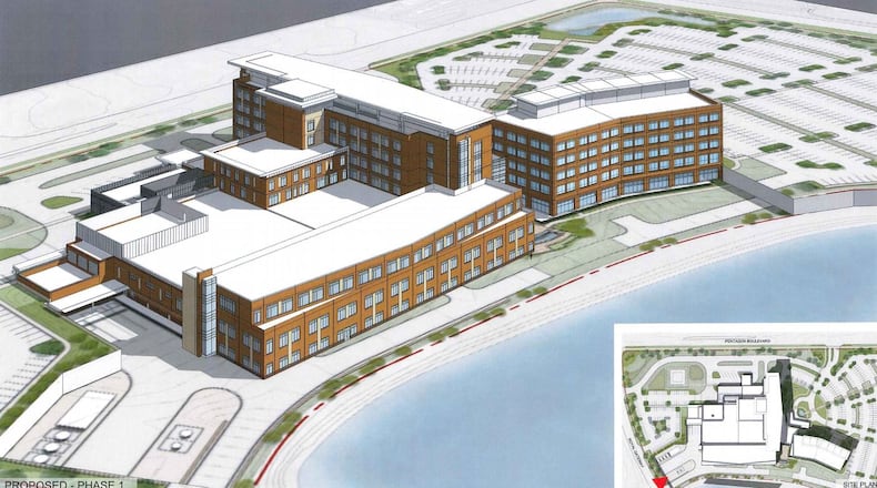 Beavercreek planning documents show the proposed three-story expansion at Soin Medical Center lining the pond at the campus. CONTRIBUTED