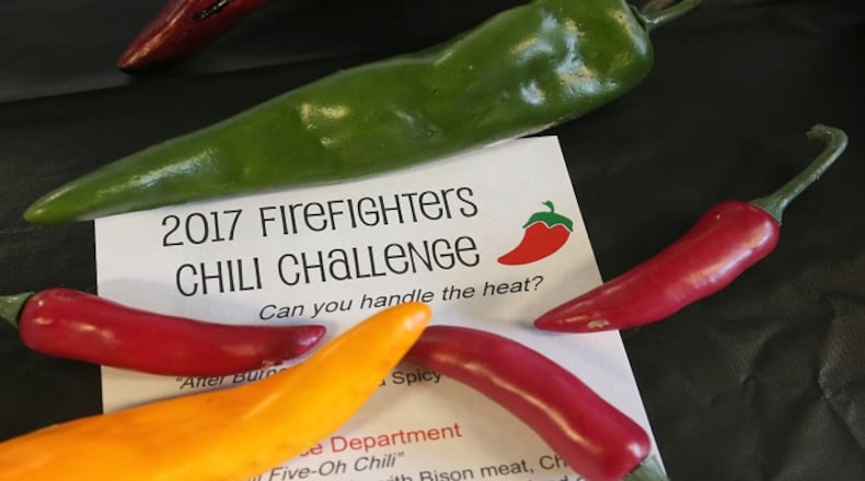 The 11th Annual Akron Firefighters Chili Challenge at Lock 3 Park on January 20, 2017, in Akron, Ohio. From left are Lt. Sierjie Lash, Capt. Scott Pascu, and Firefighter Adam Lovell. (Phil Masturzo/Akron Beacon Journal/TNS)