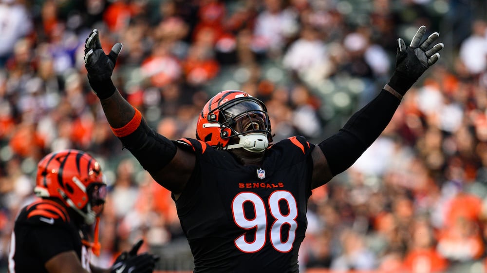 Bengals defensive lineman T.J. Slaton, Jr. celebrates a sack during their game against the Arizona Cardinals on Sunday, Dec. 28, at Paycor Stadium. JEREMY MILLER / CONTRIBUTED PHOTO