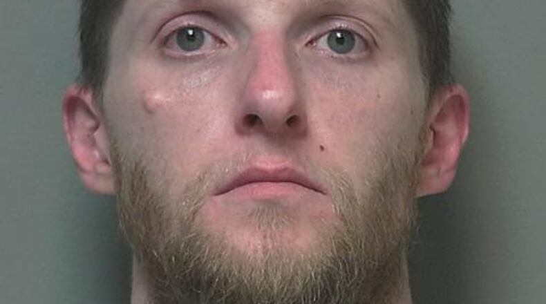 Troy Police arrested Brian Saunders on charges of child endangering after two children, age 11 and 6, found their mother dead. A third child, age 4, was also in the home. JAIL MUGSHOT