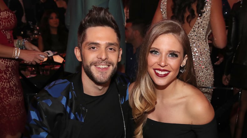 INGLEWOOD, CA - MARCH 05: Musician Thomas Rhett (L) and Lauren Akins attend the 2017 iHeartRadio Music Awards which broadcast live on Turner's TBS, TNT, and truTV at The Forum on March 5, 2017 in Inglewood, California. (Photo by Christopher Polk/Getty Images for iHeartMedia)