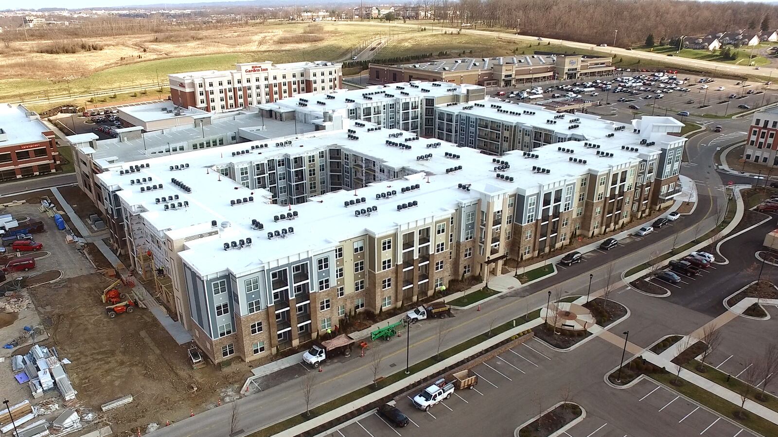The Flats at Austin Landing, which opened some of its luxury apartments in November, is expected to be fully open by the summer. TY GREENLEES/STAFF
