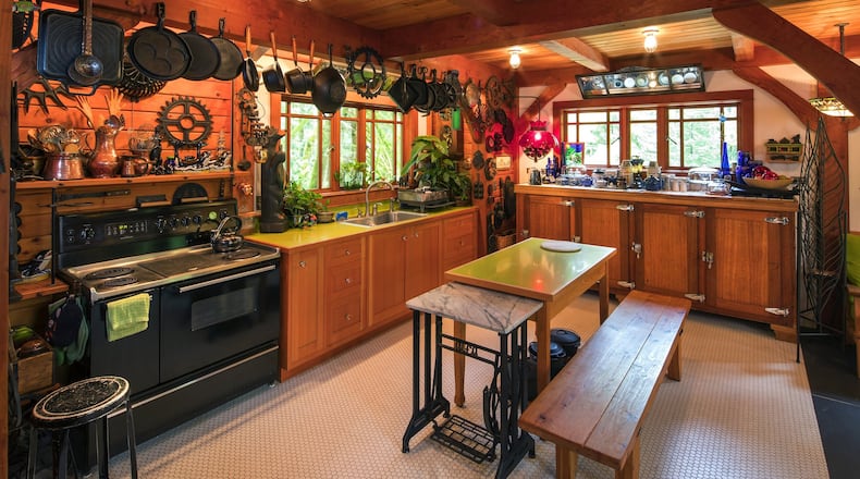 Daucey and Pat Brewington’s home outside North Bend features a mahogany fixture (far end of the kitchen under the window) in the kitchen, which is an old beer cooler from a defunct Queen Anne Hotel. (Mike Siegel/Seattle Times/TNS)
