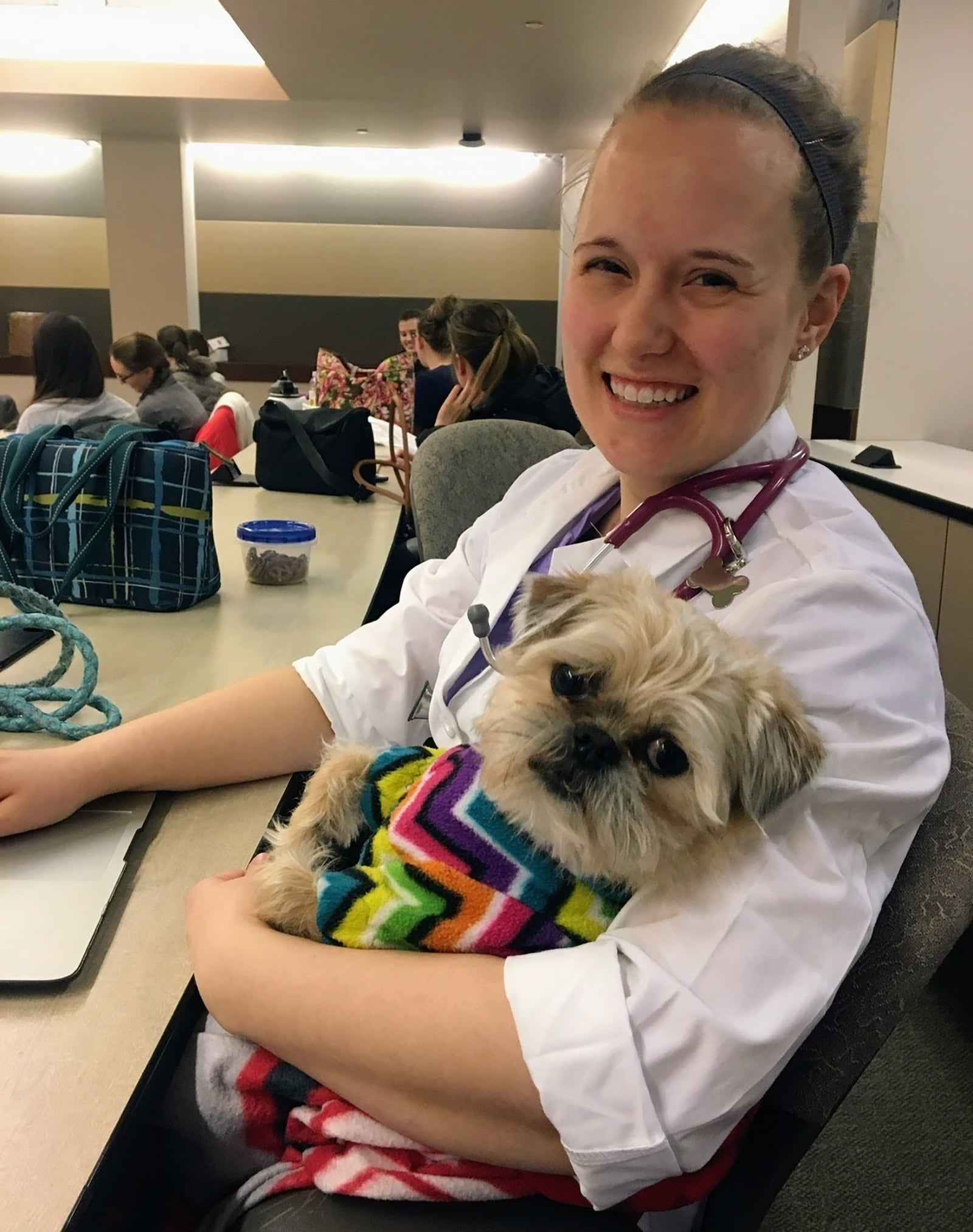 Briana Hartigan at Ohio State University in February of 2018 with her personal dog, Taz, who was visiting for a day to help the vet students learn how to perform neurologic exams. CONTRIBUTED