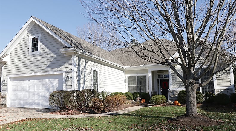 The home has about 2,400 sq. ft. of living space, including the upstairs bonus room. The community offers access to swimming pools, tennis courts, community rooms, walking trails and lawn care. CONTRIBUTED PHOTO BY KATHY TYLER