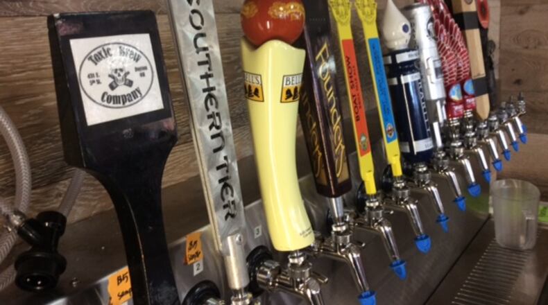 The Shell gas station and convenience store at Far Hills Avenue and Whipp Road now offers craft beer growler refills. MARK FISHER/STAFF