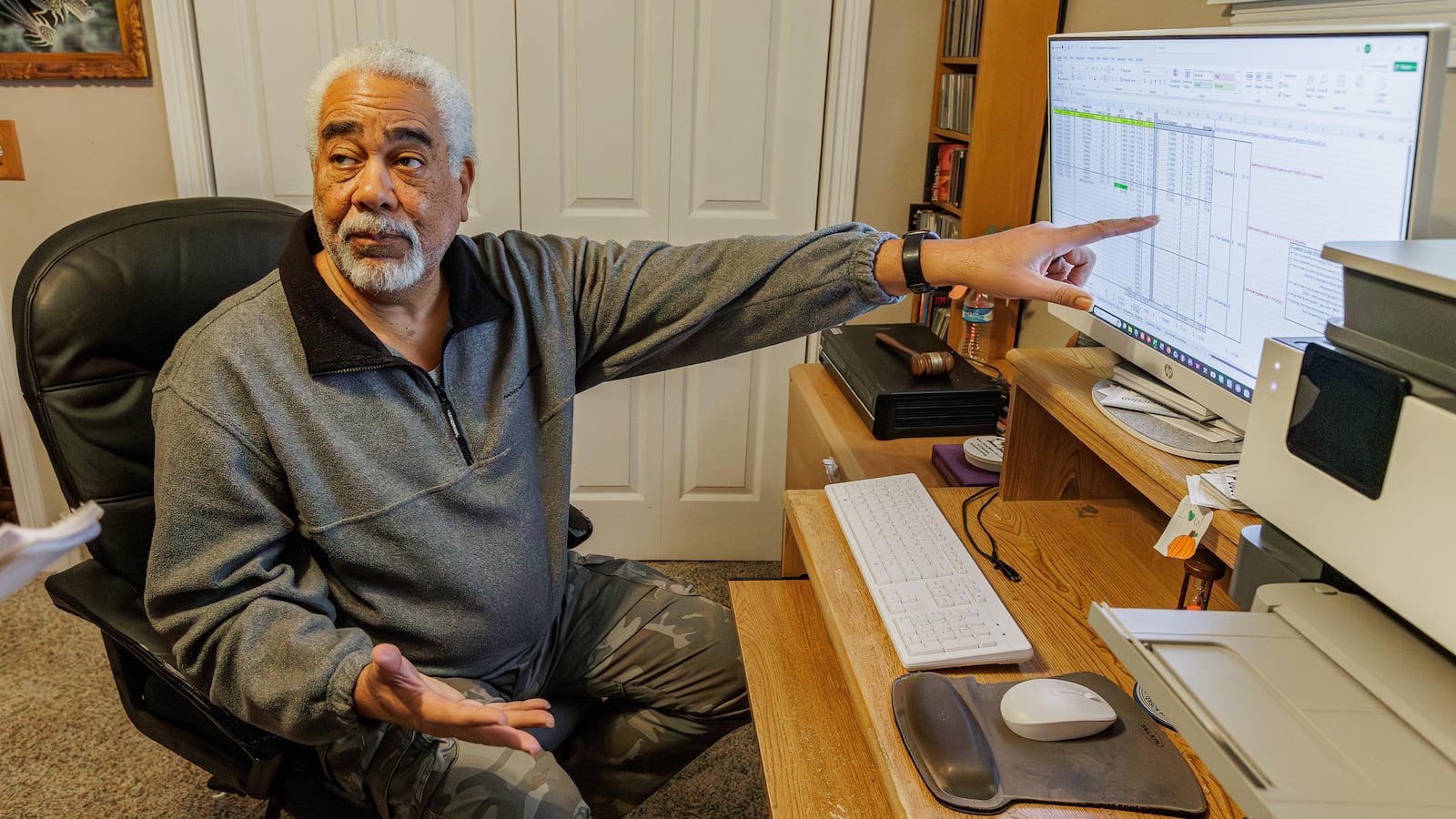 Brian Jarvis talks in his Beavercreek home while referring to a spreadsheet he has used to track electric and gas usage for 26 years. Jarvis, a retired Northrup Grumman computer engineer and former mayor of Beavercreek, says people have to self-advocate whenever possible to combat rising costs, including utility rates. He checks the Public Utilities Commission of Ohio's website daily for the latest prices and changes suppliers when possible for the best deals. BRYANT BILLING / STAFF