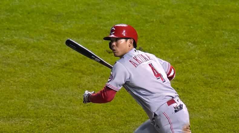 Cincinnati Reds' Shogo Akiyama watches his fly out during the ninth inning of the team's baseball game against the Chicago Cubs on Tuesday, Sept. 8, 2020, in Chicago. The cubs won 3-0. (AP Photo/Charles Rex Arbogast)