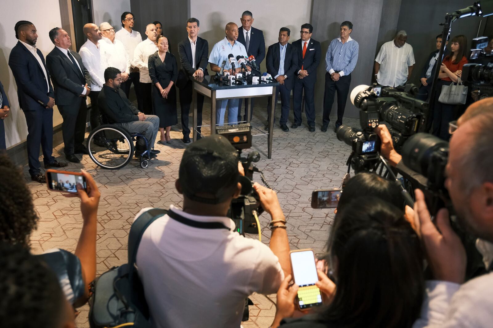 New York Mayor Eric Adams, accompanied by Dominican authorities, speaks to the press in Santo Domingo, Dominican Republic, Monday, April 14, 2025, upon arrival to pay his respects to those who died at the Jet Set nightclub after its roof collapsed. (AP Photo/Ricardo Hernandez)