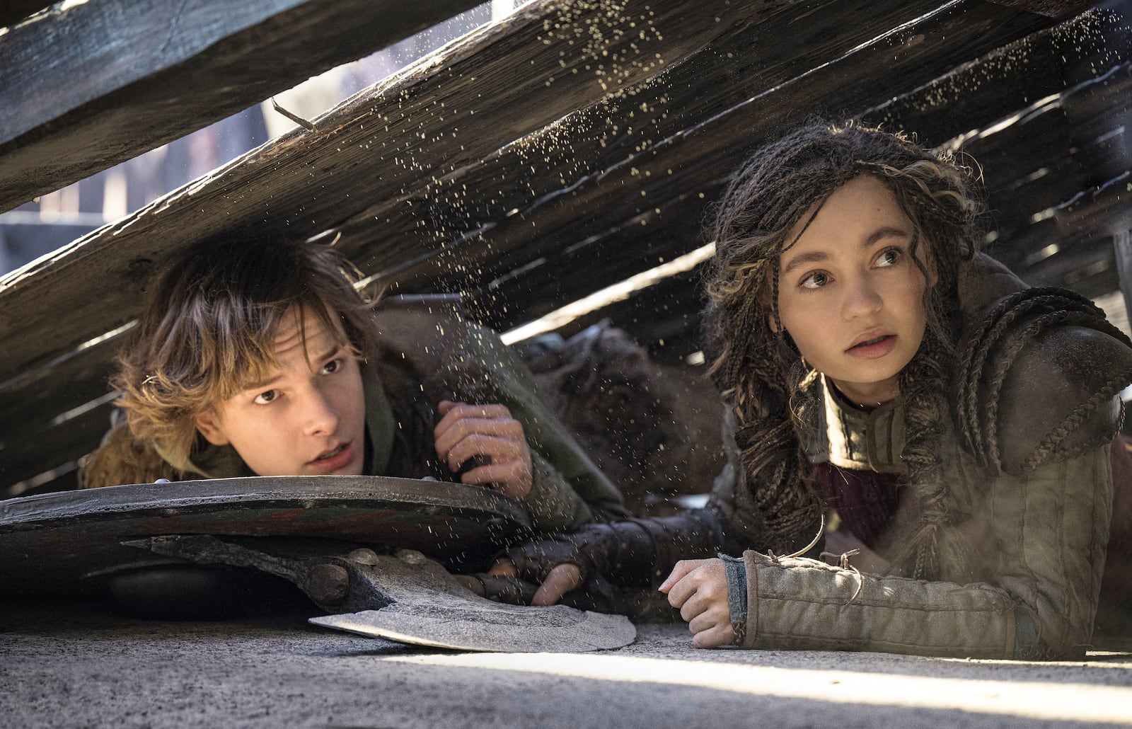 This image released by Universal Pictures shows Mason Thames, left, and Nico Parker in a scene from "How to Train Your Dragon.", (Universal Pictures via AP)