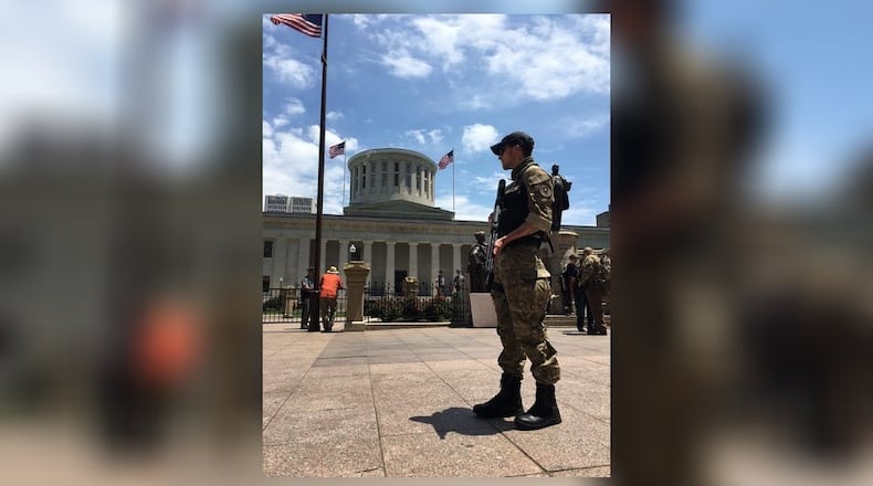 The battle over gun laws is fought at the Ohio Statehouse every year. Those for and against legislation routinely lobby lawmakers, pack hearing rooms and hold rallies, such as this demonstration in favor of the right to openly carry firearms in Ohio. Laura Bischoff/Staff