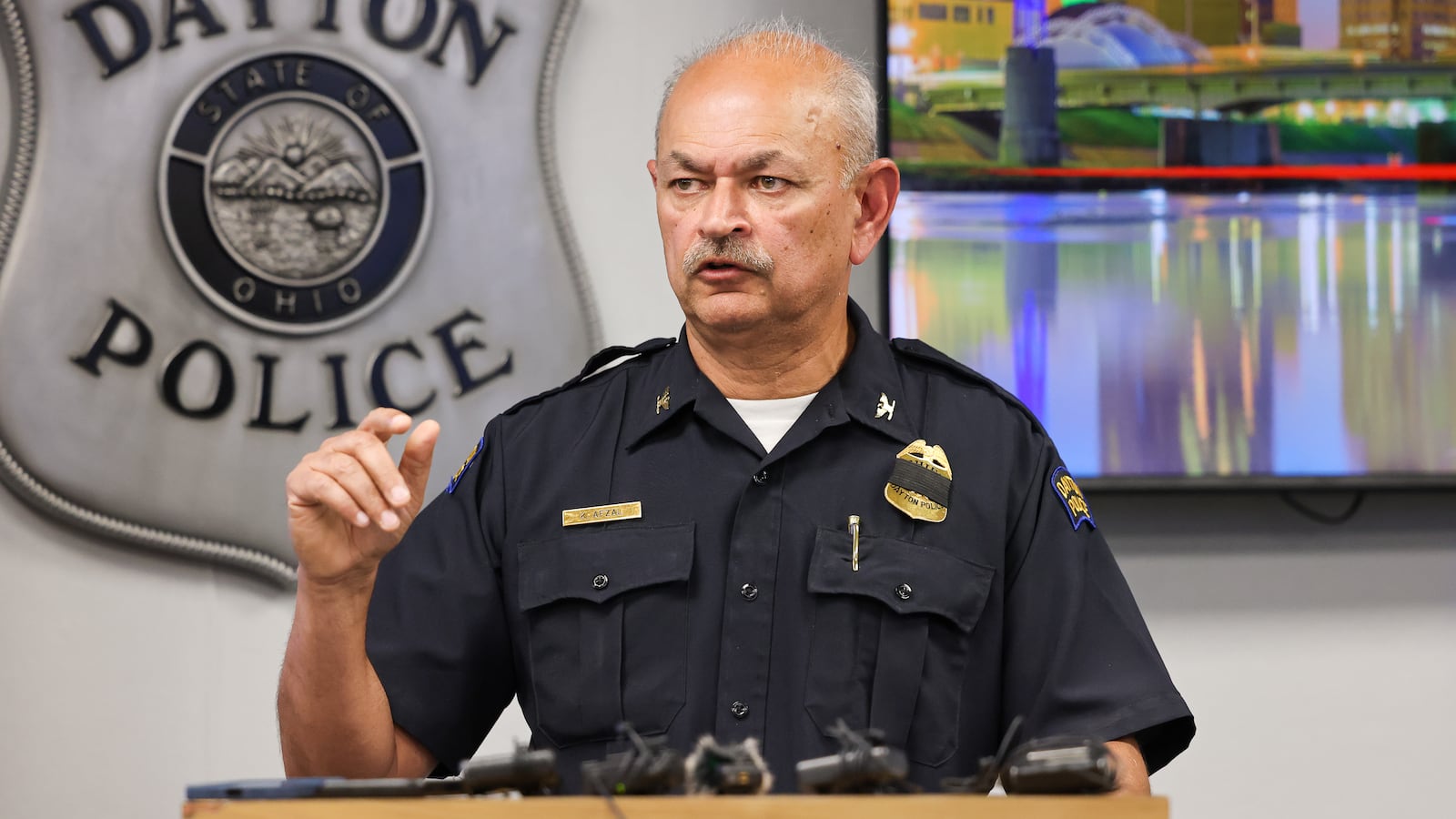 Dayton Police Chief Kamran Afzal speaks during a news conference on Friday, July 25 at the department's headquarters in downtown Dayton. Afzal provided an update on an officer-involved shooting that occurred Thursday near West Third Street. BRYANT BILLING / STAFF