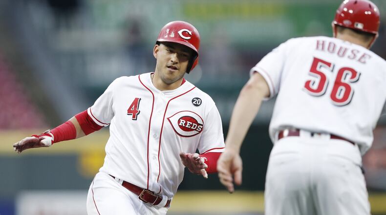 Jose Iglesias of the Cincinnati Reds rounds the bases after hitting a grand slam in the second inning against the Pittsburgh Pirates at Great American Ball Park on Monday, July 29. Photo by Joe Robbins/Getty Images