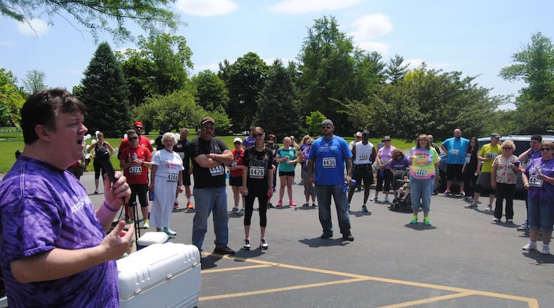 Ron Ward, founder of Celebrating Restoration, has relapsed and is receiving treatment at a drug center in Florida. Here, Ward speaks during the group’s inaugural Sparkles For Life 5K Run/Walk at Woodside Cemetery in Middletown in 2016. ERIC SCHWARTZBERG/2016