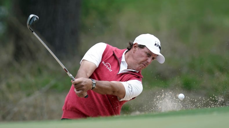 Phil Mickelson plays a shot from a bunker on the seventh hole during round-robin play at the Dell Technologies Match Play golf tournament, Friday, March 23, 2018, in Austin, Texas. (AP Photo/Eric Gay)