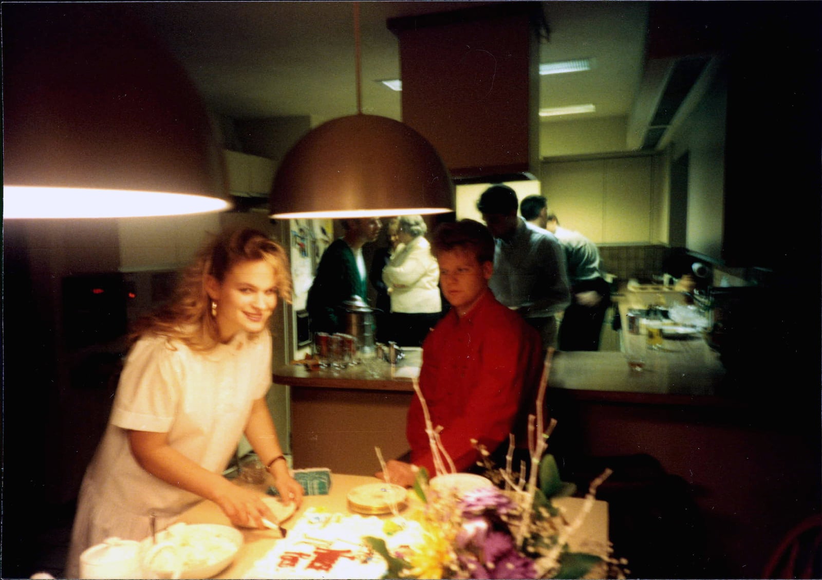 Ross (L) with her husband to be Matt Ross celebrating her graduation from nursing school in 1991.