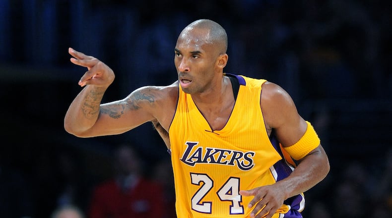 The Los Angeles Lakers' Kobe Bryant celebrates his 3-pointer against the Minnesota Timberwolves in the second quarter at Staples Center in Los Angeles on Wednesday, Oct. 28, 2015. (Wally Skalij/Los Angeles Times/TNS)