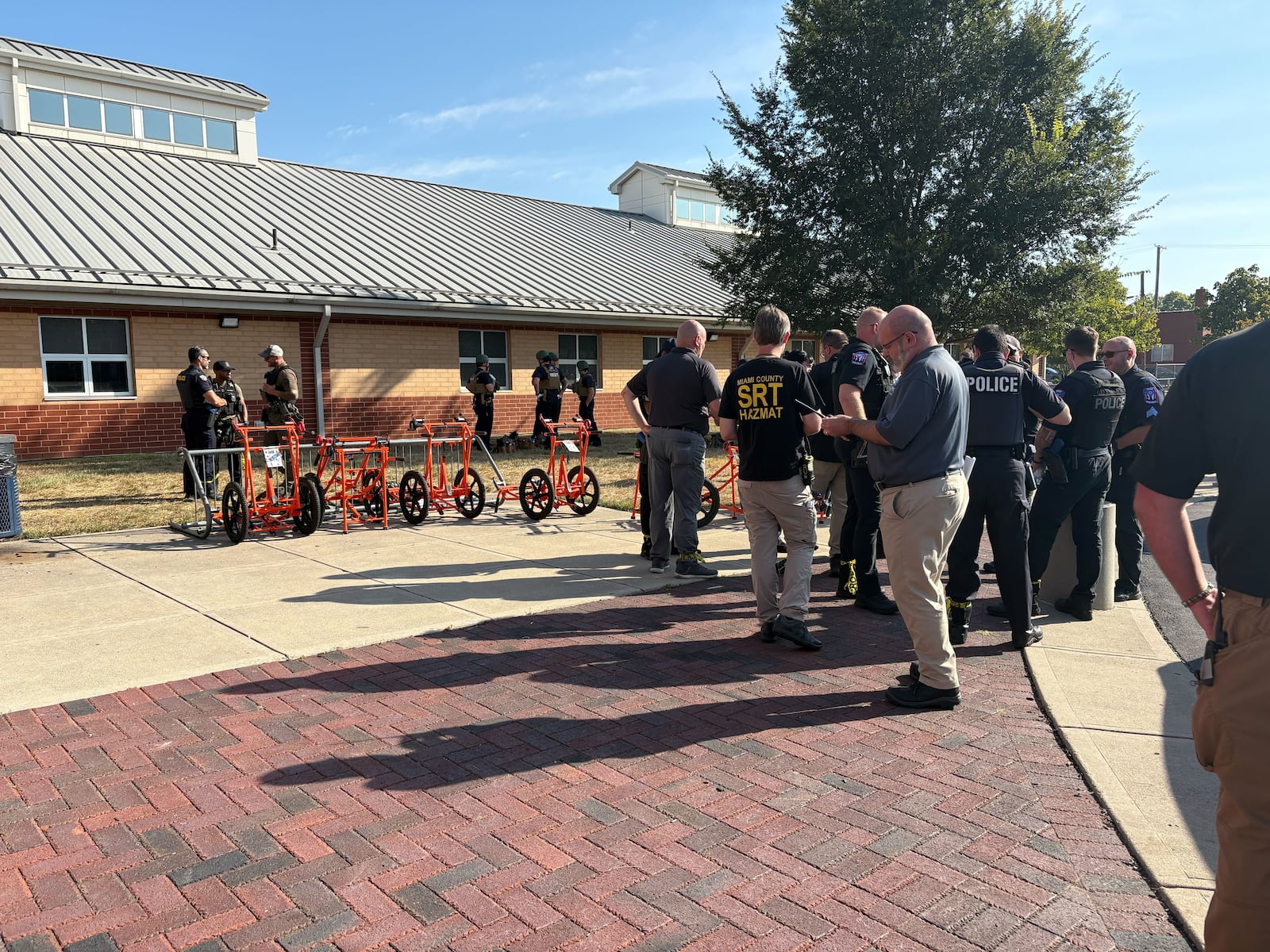 Dayton law enforcement, fire and EMS agencies participated in a mock mass casualty scenario Sept. 13 at Kiser Elementary School as part of Dayton Children’s Hospital’s full-scale emergency preparedness drill conducted by the Dayton Metropolitan Medical Response System (MMRS). Brooke Spurlock/Staff
