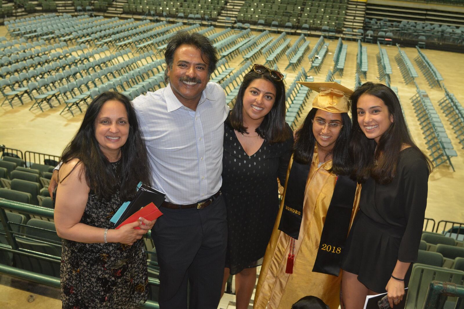 The Kulkarni Family at Trisha’s Centerville High graduation ceremony at Nutter Center from (l to R) Benu ( mom), Raj (dad) (sister) Nina, Trisha and (sister) Esha. CONTRIBUTED
