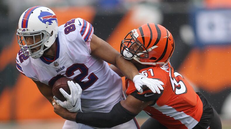 CINCINNATI, OH - OCTOBER 8: Kevin Minter #51 of the Cincinnati Bengals tackles Logan Thomas #82 of the Buffalo Bills during the second quarter at Paul Brown Stadium on October 8, 2017 in Cincinnati, Ohio. (Photo by John Grieshop/Getty Images)
