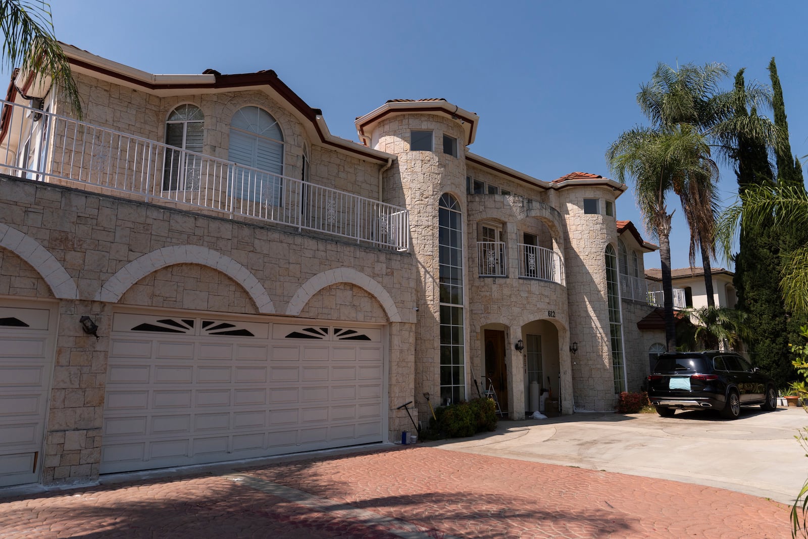 The home of Silvia Zhang and Guojun Xuan is seen on Wednesday, July 16, 2025, in Arcadia, Calif., where a number of children were removed from the couple's home after a child abuse allegation in May, according to Arcadia police. (AP Photo/Jae C. Hong)