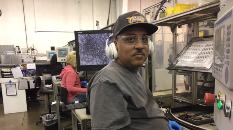 A worker at Norwood Medical, which has more than 1,000 employees on its Dayton campus. THOMAS GNAU/STAFF