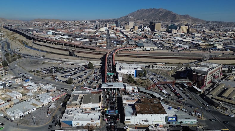 Cars cross the "Paso del Norte" International Bridge at the U.S.-Mexico border between Ciudad Juarez, Mexico, bottom, and El Paso, Texas, top, Wednesday Feb. 11, 2026. (AP Photo/Christian Chavez)