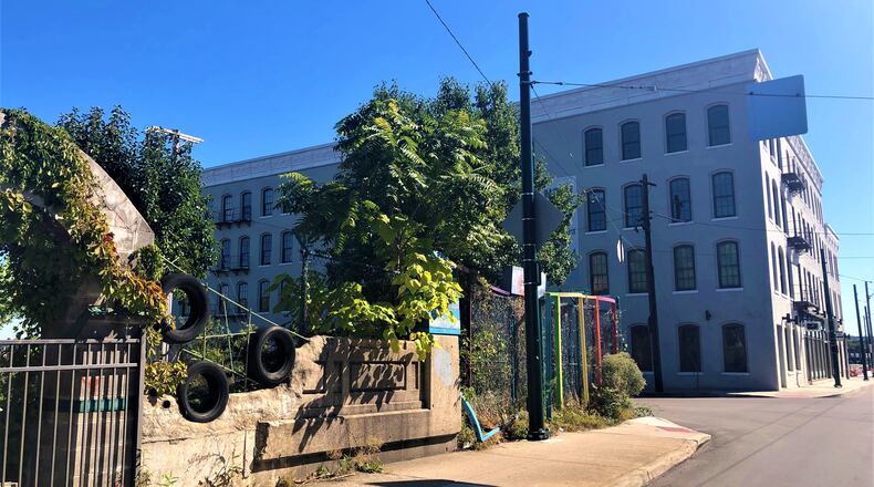 Developer Weyland Ventures plans to build 153 new apartments on the former Garden Station site at Wayne Avenue and East Fourth Street. The vacant property is across the street from the firm’s Wheelhouse Lofts apartments. CORNELIUS FROLIK / STAFF