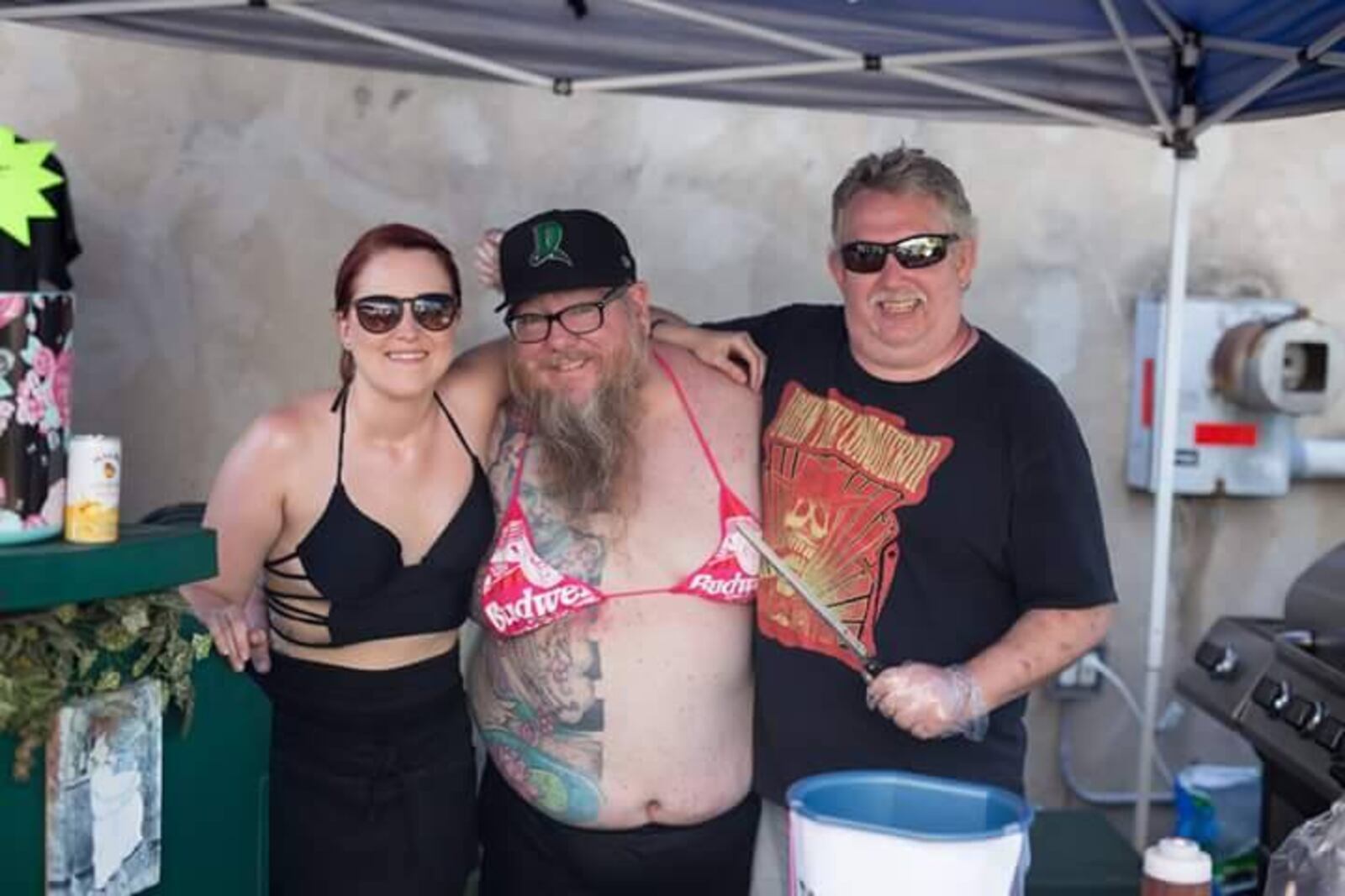 The Tumbleweed Connection 454 E. Fifth St. in Dayton's Oregon District will hold its fifth annual Critter & Car Wash for Charity on Aug. 20, 2017. 
Binki clad men and women wash cars to benefit Adopt-a-Pit and Summit for Soldiers.