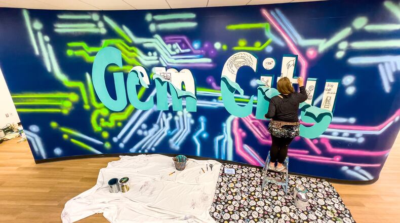 Dayton artist Tiffany Clark, founder of the Mural Machine, was commissioned to create a mural for AES Ohio's new Smart Operations Center.