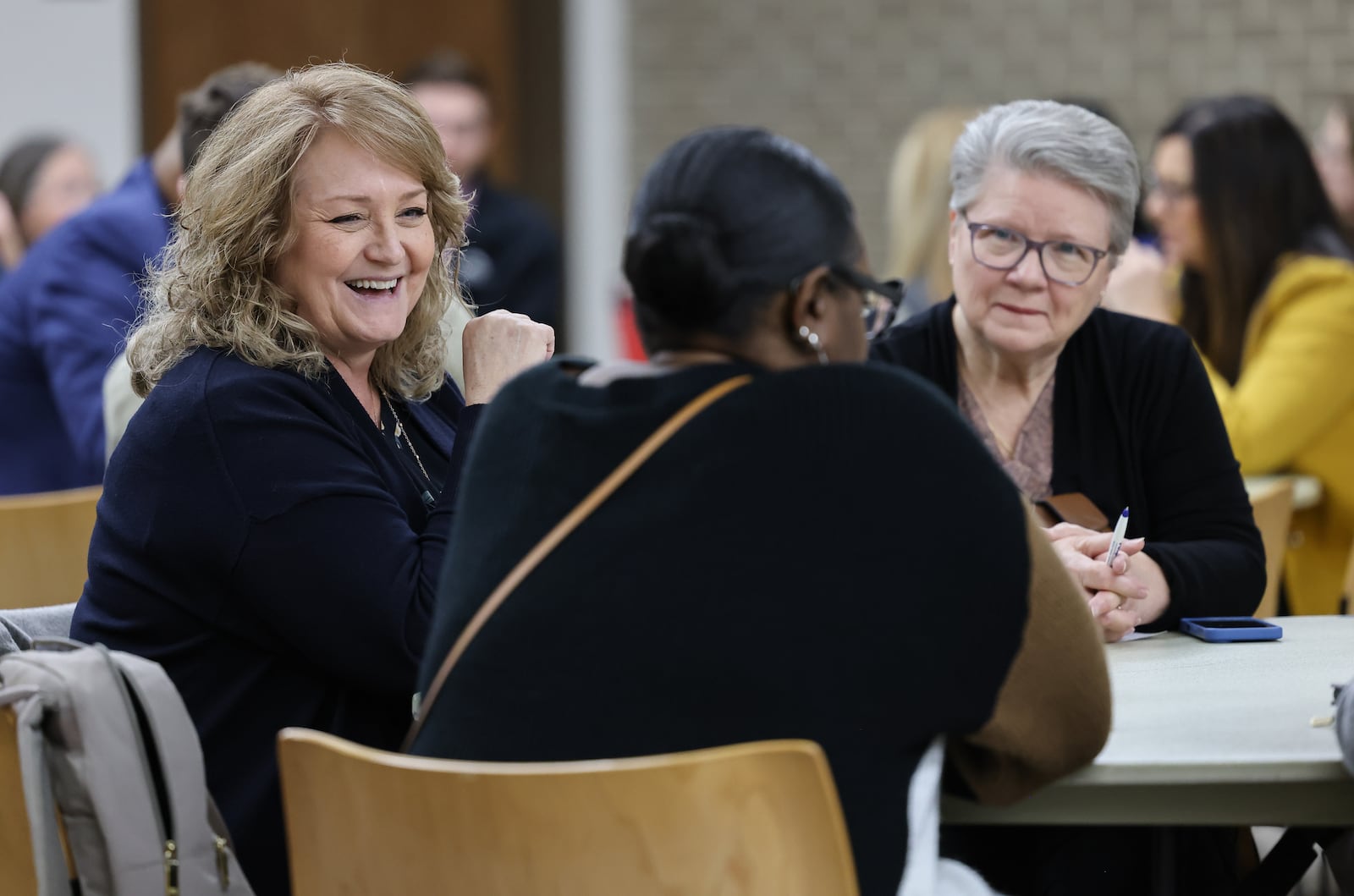 Attendees at the CommUnity Connection Coalition meeting talk in breakout groups on Wednesday, March 18 at Clark State College. BRYANT BILLING / STAFF