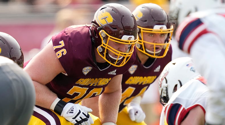 In this image provided by CMU Athletic Communications, Central Michigan offensive lineman Bernhard Raimann lines up against Robert Morris during an NCAA college football game on Sept. 11, 2021, in Mount Pleasant, Mich. Raimann grew up in Austria and, like many European kids, he was initially into soccer. But he signed up as a teenager to play with the Vienna Vikings, an American football club team. Tall and gangly, he was originally a wide receiver. (Steve Jessmore/CMU Athletic Communications via AP)