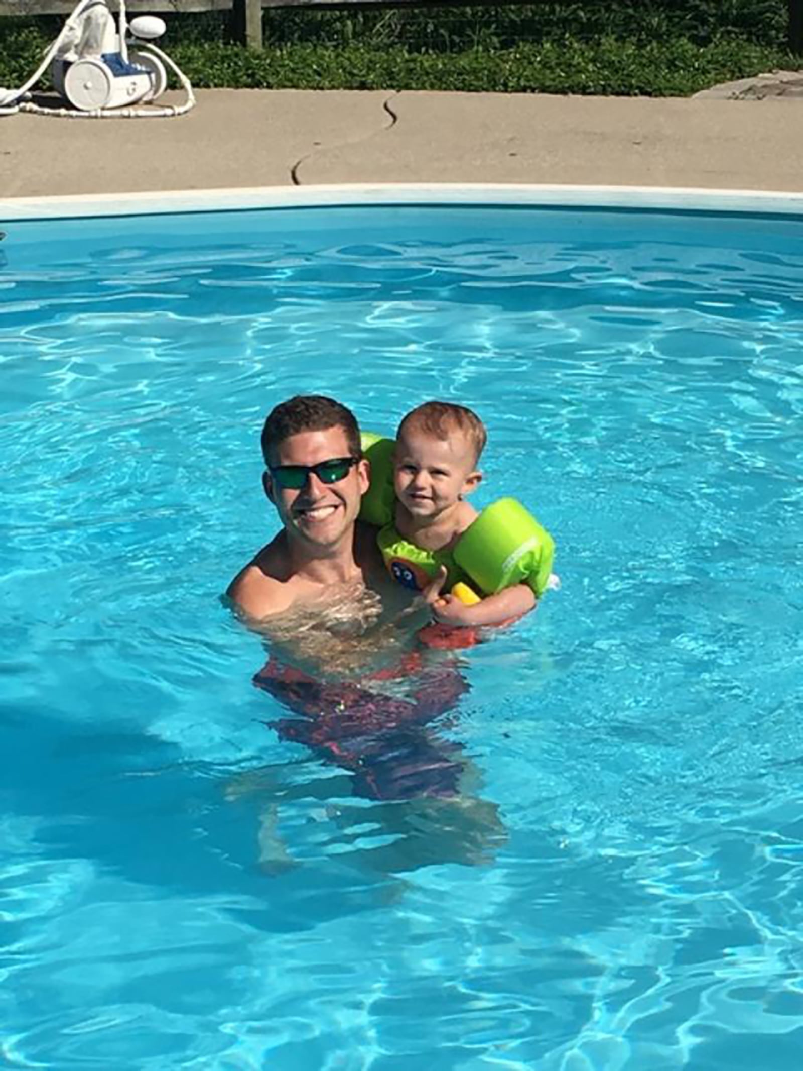 Tyler Gibble as a one year swimming with his dad David in his grandparents backyard pool. Tyler's parents decided to start him in swim lessons so he could learn important safety skills. CONTRIBUTED