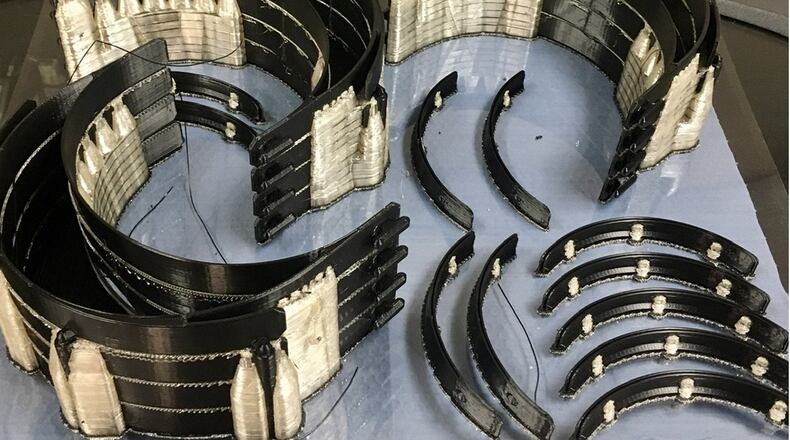 The Air Force Institute of Technology’s additive manufacturing laboratory is using 3D printing to develop N95 face shield prototypes to extend the longevity of the masks. Final requested designs include 3D printed structural components for a full face shield. (Courtesy photo)